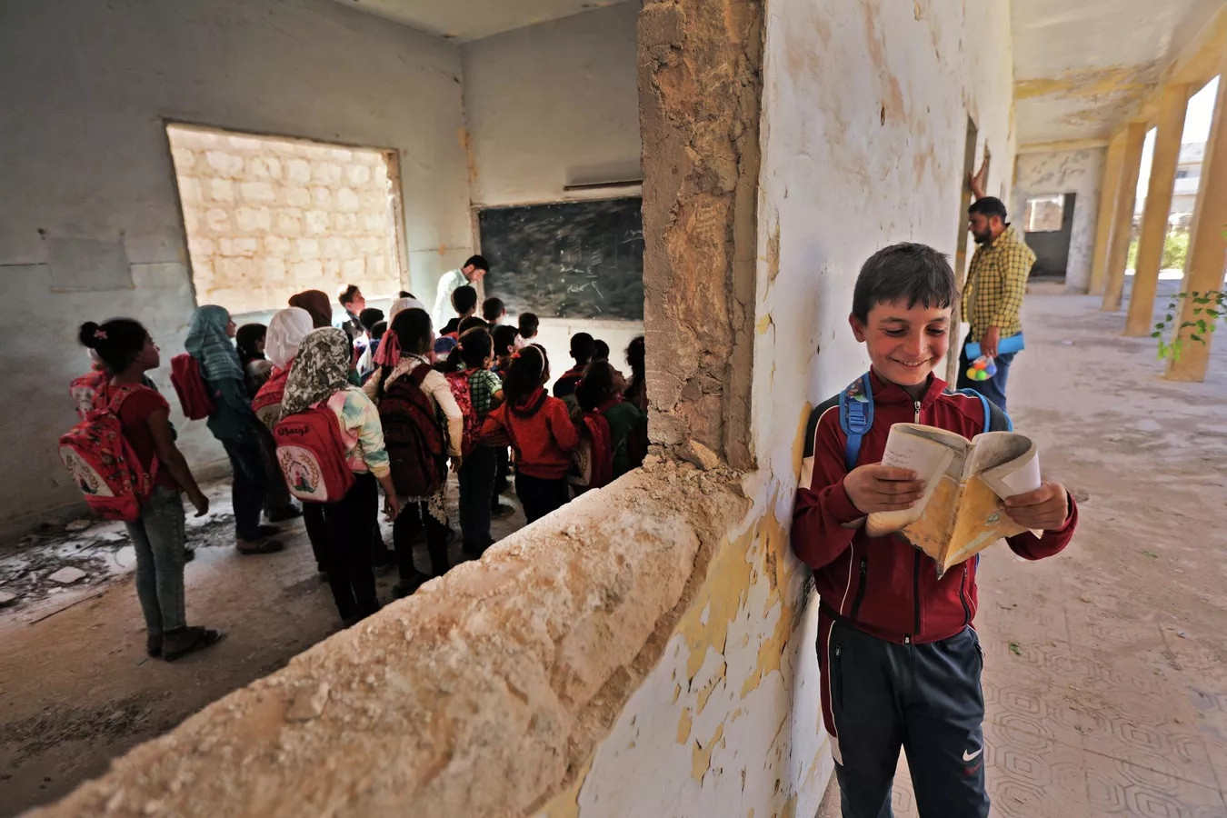 Học sinh Syria trong một lớp học ở Tadif, Syria.
