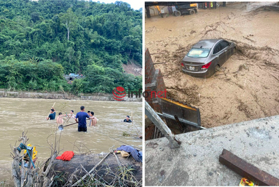 Đang trục vớt xe ô tô bị lũ cuốn trôi xuống sông ở Nghệ An
