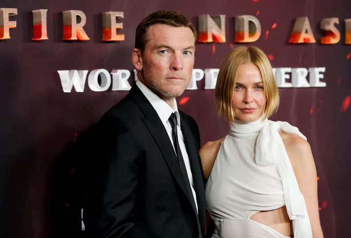 Sam Worthington bên vợ người mẫu.