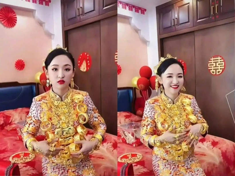 Cô dâu mặc một chiếc váy thêu vàng, cổ đeo một sợi dây chuyền làm bằng vàng hình rồng phượng. Ảnh: Weibo.