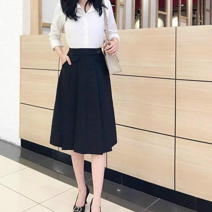 Váy dài qua gối thường không phải là sự lựa chọn tốt cho những người có phần lưng dài chân ngắn. (Ảnh: Pinterest)