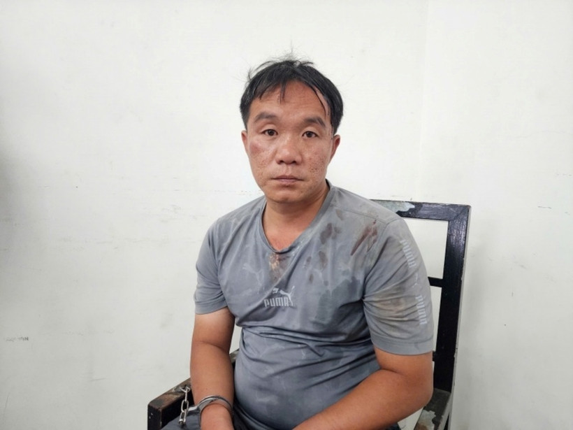 Đối tượng Dương Hữu Trí tại cơ quan công an. Ảnh: Công An Nhân Dân