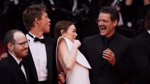 emma stone recoils from a bee on cannes 36604.gif