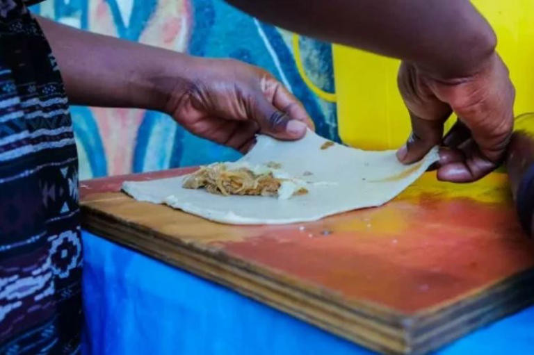 Người phụ nữ bán hàng rong ở Haiti đầu độc tử vong 40 thực khách vì lý do không tưởng- Ảnh 1.