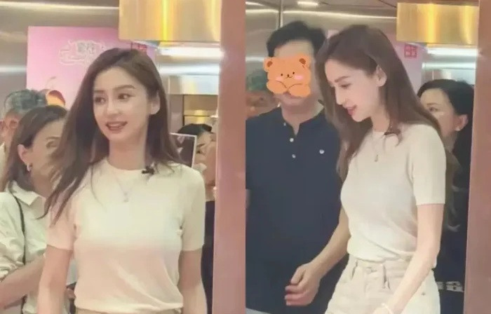 Angelababy đi quảng cáo đồ ăn ở ngoài đường.