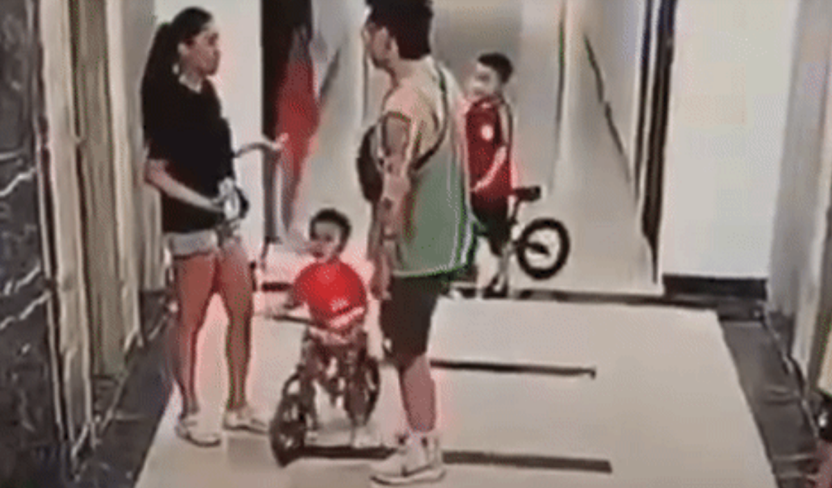 Xác minh vụ người đàn ông xăm trổ hành hung phụ nữ ở chung cư Hà Nội - Ảnh 1.