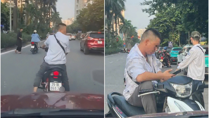 Hình ảnh nam thanh niên chặn đường, đòi tiền đỗ xe ở Hàm Nghi.