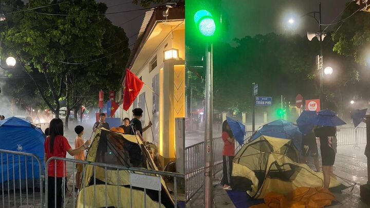 Hình ảnh gia đình dựng lều tại ngã tư đường Trần Phú - Hùng Vương khiến dân mạng tranh luận.