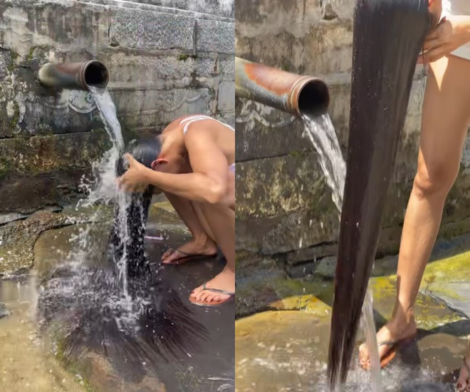 Giật mình cảnh Á hậu Vbiz vô tư tắm gội nơi công cộng netizen soi kĩ 1 chi tiết