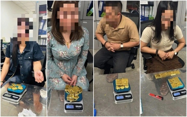 giau hon 12kg nghi la vang trong do lot, 4 hanh khach bi bat o noi bai hinh anh 1
