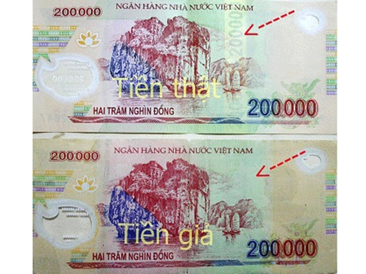 Tiền giả 200.000 đồng xuất hiện trở lại. (Ảnh: Người lao động)