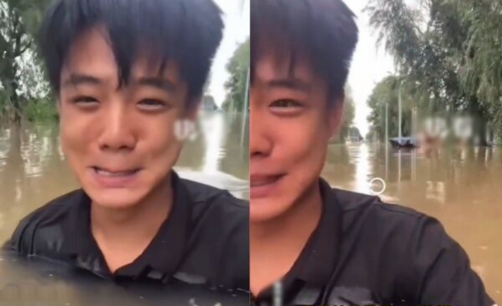Khi nước ngập đến gần cổ, nam nhân viên mới quay video xin chủ cửa hàng cho nghỉ làm. (Ảnh cắt từ clip: Sina)