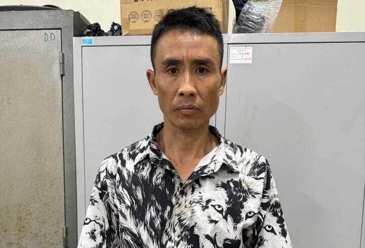 Nguyễn Khắc Tú tại cơ quan công an.